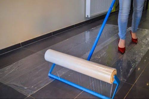 a woman in red shoes and a blue plastic bag