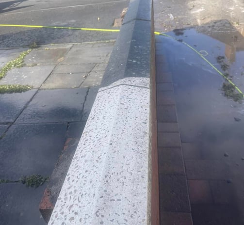 outdoor cleaning services Fife - coping stone half clean, half dirty