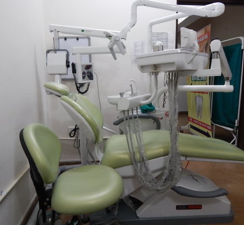 dental chair with doctor stool in a teeth clinic