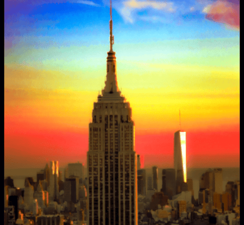 a city skyline view of a city at sunset