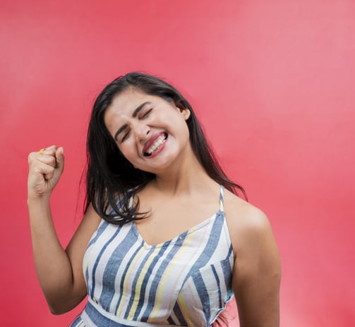a Ads woman with a smile on her face and a red background