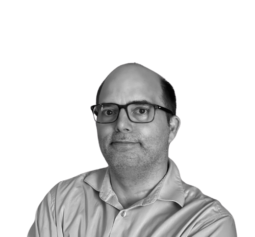 a man with glasses and a shirt on