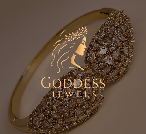 a gold bracelet with a gold bracelet and a gold bracelet