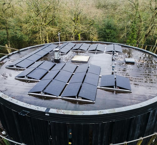 Few rows of solar panels on a circular building