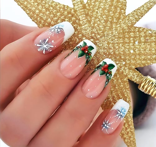Diseño de uñas navideñas de flor de pascua
