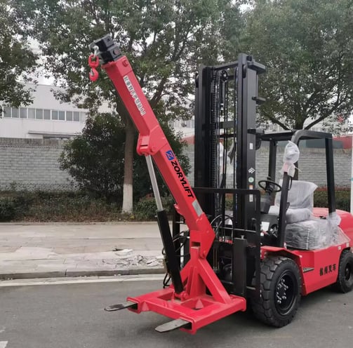 Zorylift forklift crane attachment on red forklift, ready for operation.