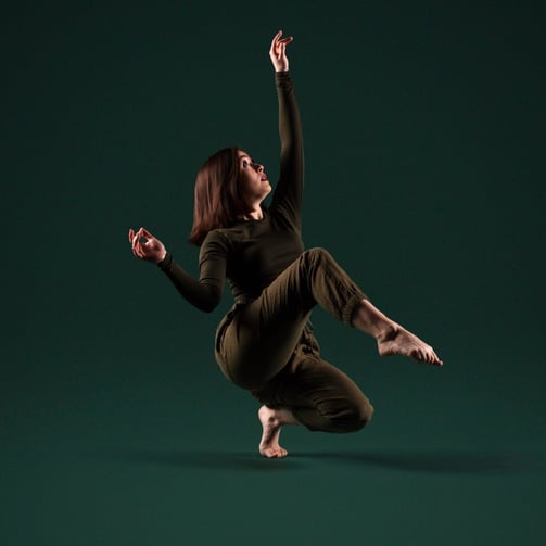 WCDC dancer balancing on one foot.