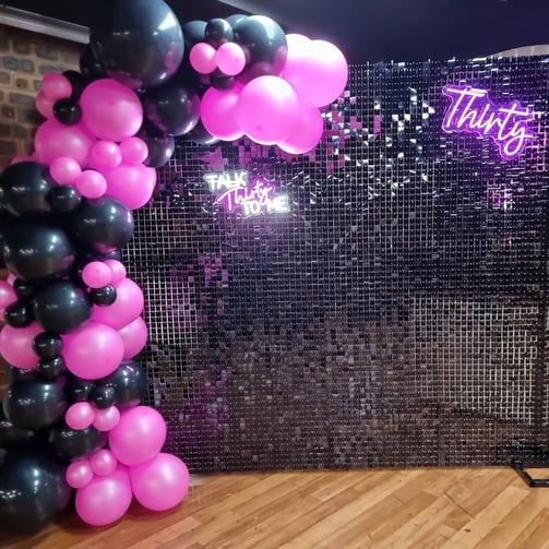 Black shimmer wall and hot pink neons for Kristen's 30th in Acacia Ridge, Brisbane.