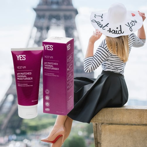 Woman in Paris, with a box of Yes moisturiser next to her.