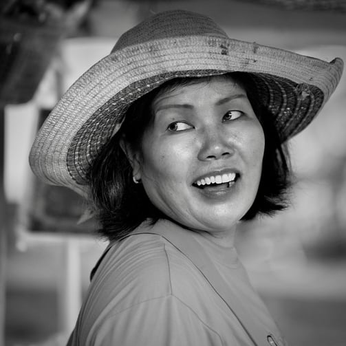 A candid street portrait in Thailand by street photographer Peter Pickering