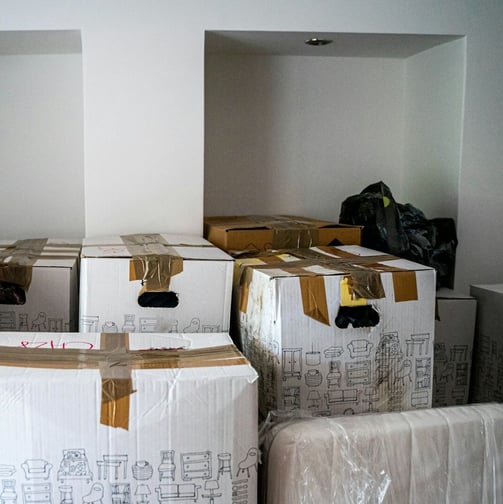boxes from old home before moving cleaning service