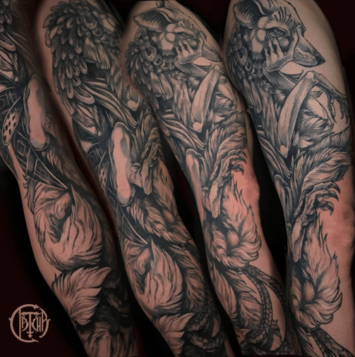 a man with tattoos on his arm and leggings datcha tattoo tatouage gap 05