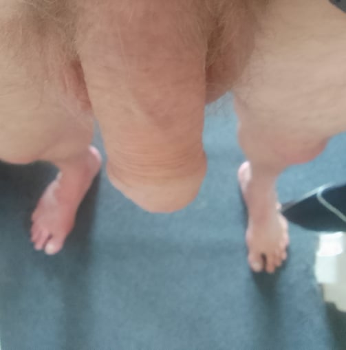 Axel TheBeast standing showing his penis