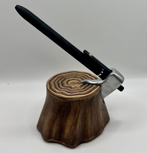 An axe-shaped pen dock