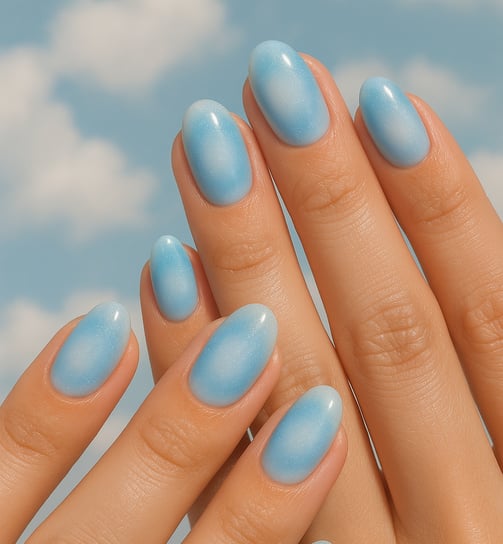 round nails featuring sky blue and white gradient aura nail design, subtle shimmer, soft clouds
