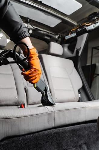 Professional interior steam cleaning of car seats and carpets