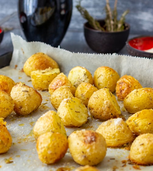 a tray of garlic parmesan roasted potatoes