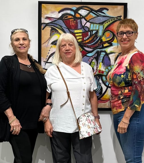 Gallery photo of Shoshana, Vera and Sue at an art show
