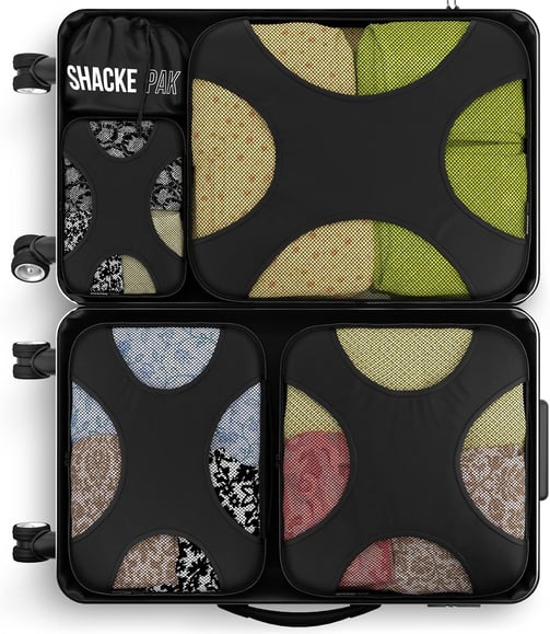 a suitcase with a variety of different types of luggage