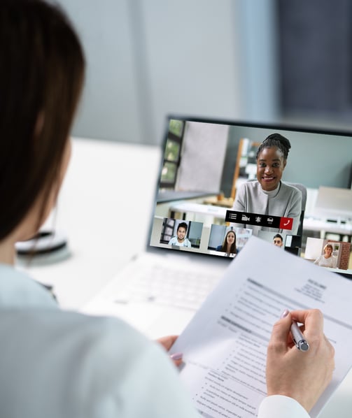 a business owner is in a meeting with her virtual finance team