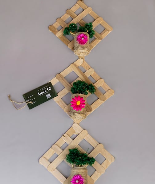 "Handmade recycled house model crafted from eco-friendly materials"