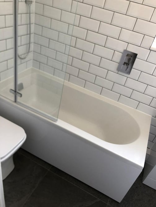rupert de la mare white tile installation and bath and toilet