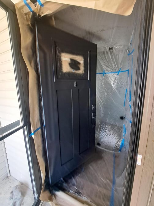 black door spray painted in Brighton by Rupert De La Mare