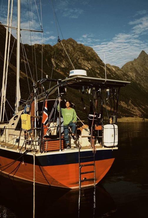 Exploring the fjords aboard a cozy sailboat—Jolly Good Times Sailing in Arctic Norway.