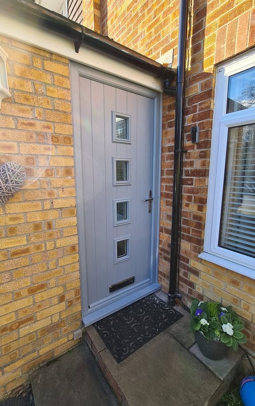 new silver grey front door with 4 panels of glass fitted in chandlers ford by buildmydoor