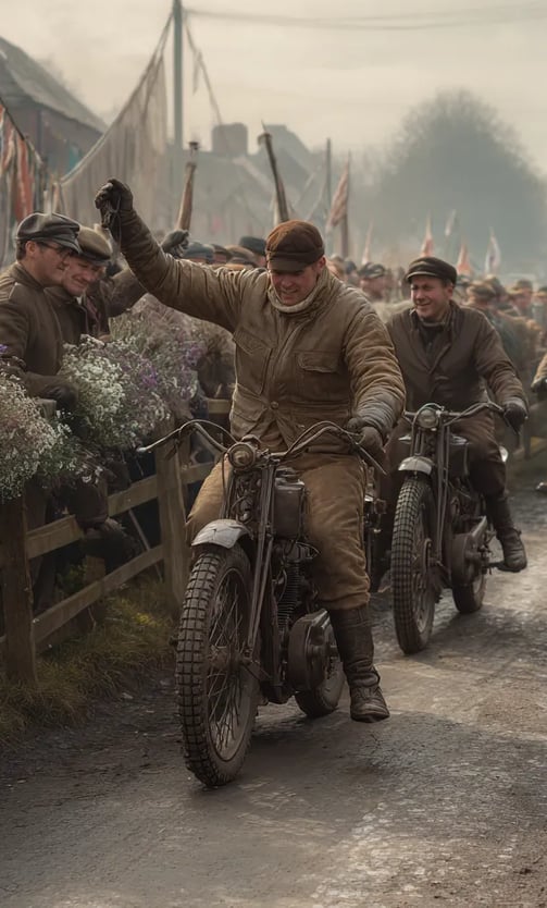 triumphant rider in a saffron sash and leather gauntlets raises a hand atop his motorcycle