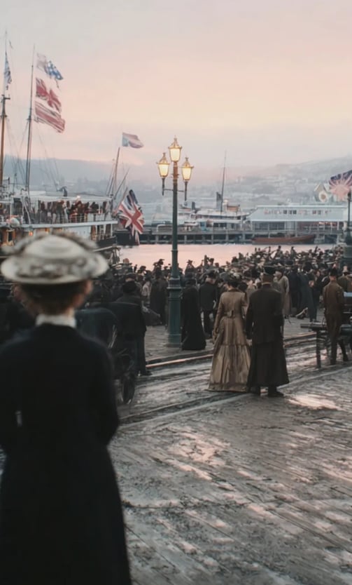 Dusk settles on Princes Wharf as celebratory crowds gather along the harbor
