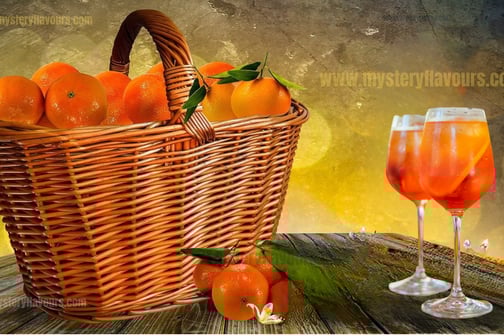 A basket of oranges with a glass of juice is an Italian tradition.