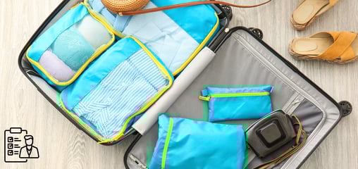 a suitcase with a lot of clothes and accessories