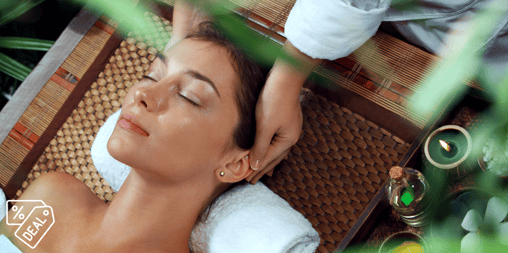 a woman getting a massage at a spa