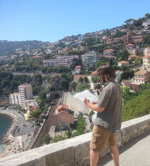 City sketcher artist Evgeny Bondarenko in France