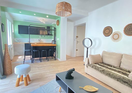 a living room with a couch and a table