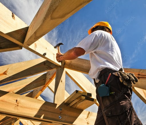 a construction worker is working on a roof truss truss truss truss truss truss truss truss