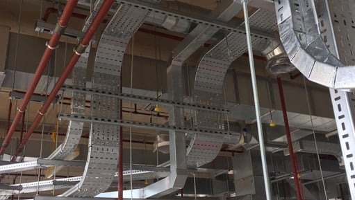 a large metal pipework in a building, electrical