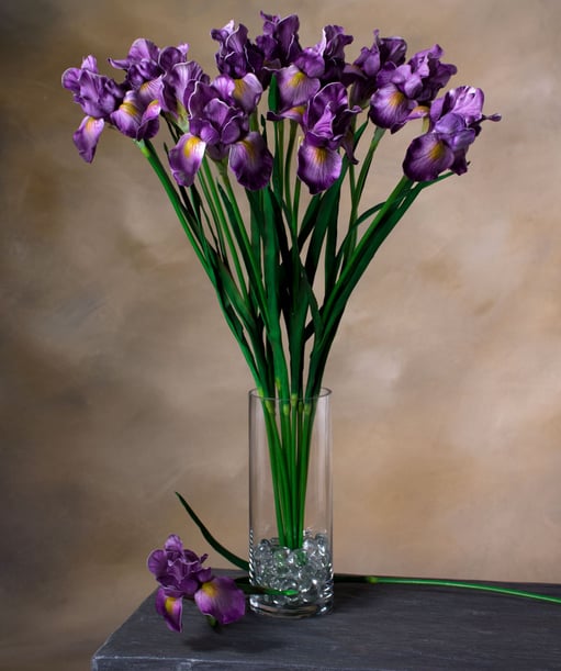 purple faux flowers in a vase
