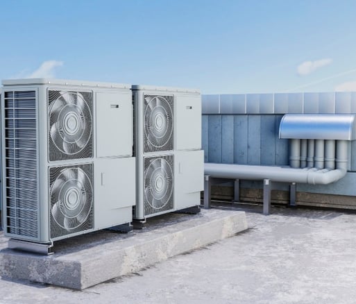 a couple of air conditioning units on a roof top