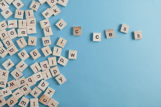 letter tiles spelling the word 'success'