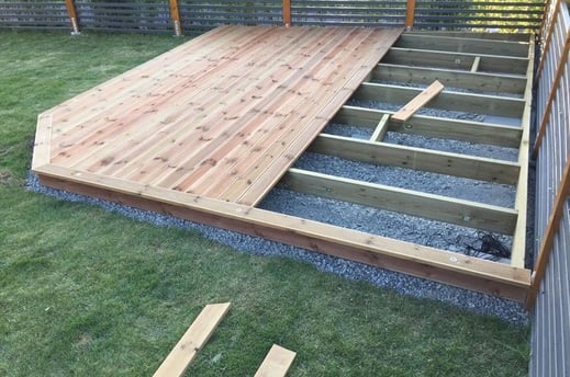 a deck deck with a deck and stairs