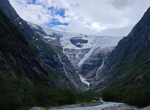 Kjenndal Glacier with lake and mountain in Norway