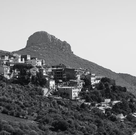 a mountaintop with a view of a mountain range