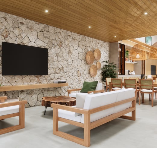 living com parede em pedra e decoração em fibra natural de uma consultoria de interiores