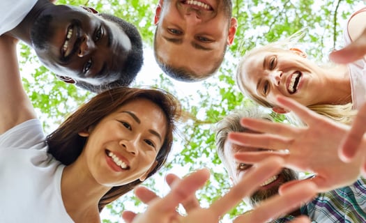 a group of people standing in a circle