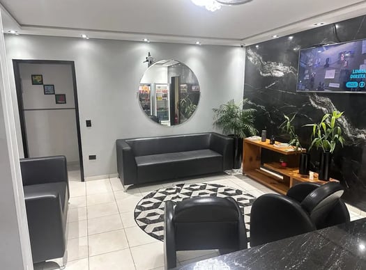 Hall Sala de espera com televisão e café