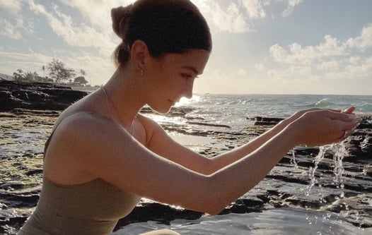 Woman holding healing water