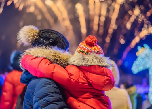 Father holding child enjoying Ballarat Winter Festival 2025 – family moment near winter lights