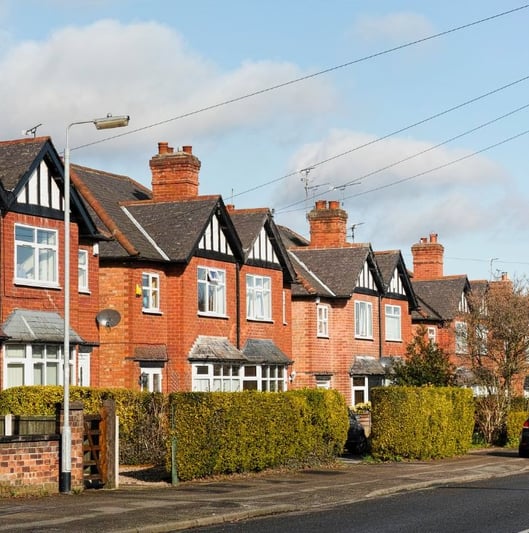 houses in Ironbridge with a car parked on the side of the road